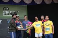 Director of Game Changer, Raksha Ramaiah honours runners from the Indian Armed forces for their support in recent flood relief
